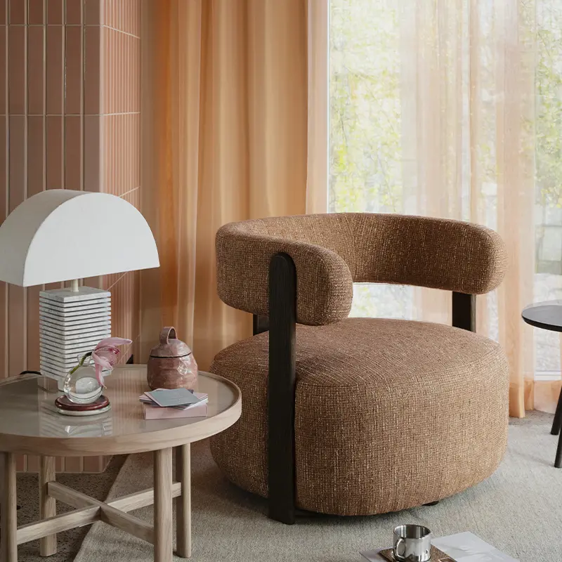 Jenison lounge chair orange brown marsden coffee table.