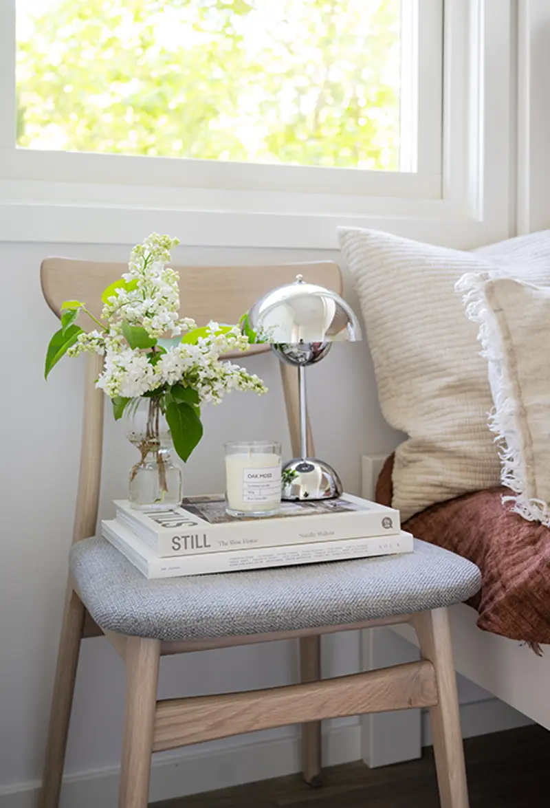 Rodham chair whitepigmented bedsidetable Image portrait px.