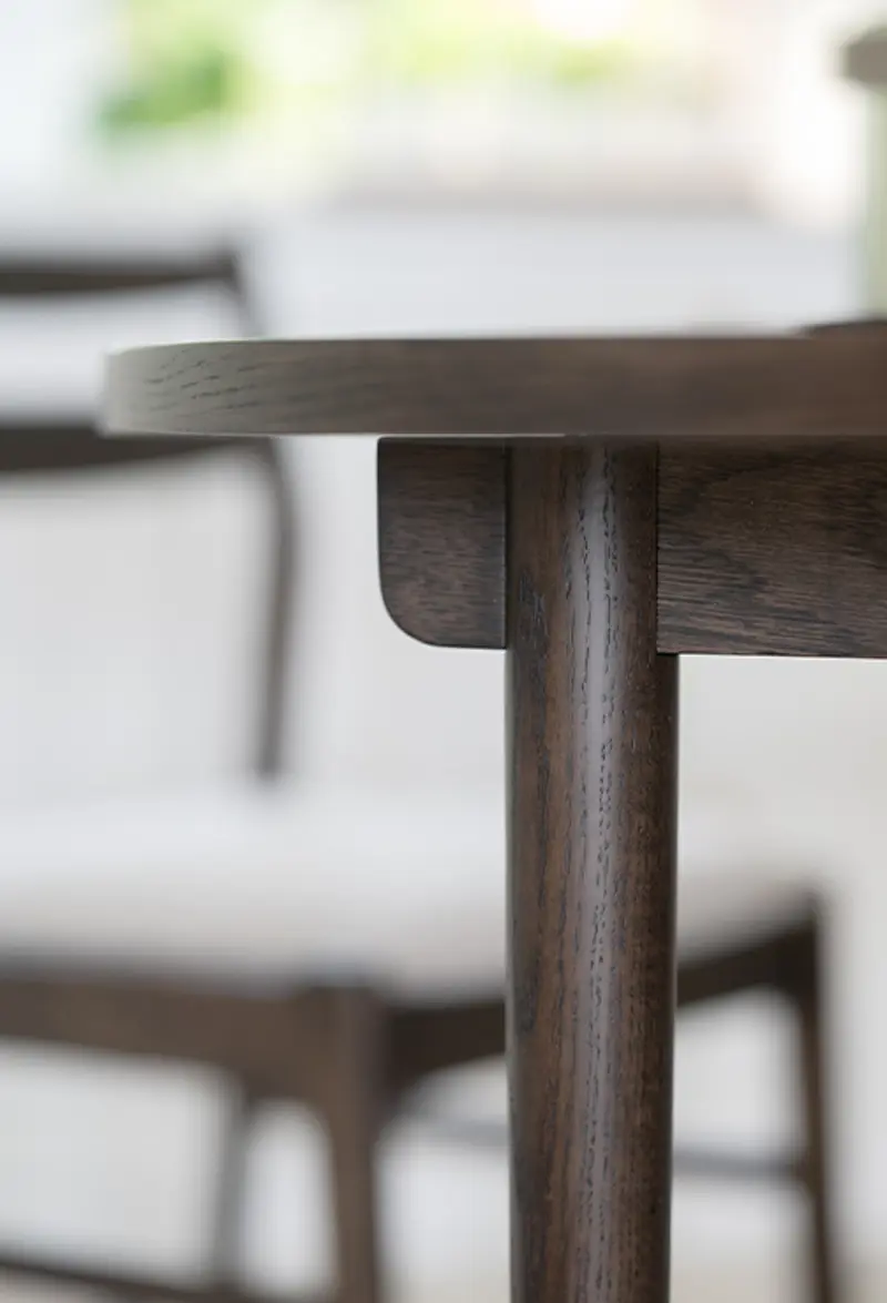 Farimount dining table closeup details brown.