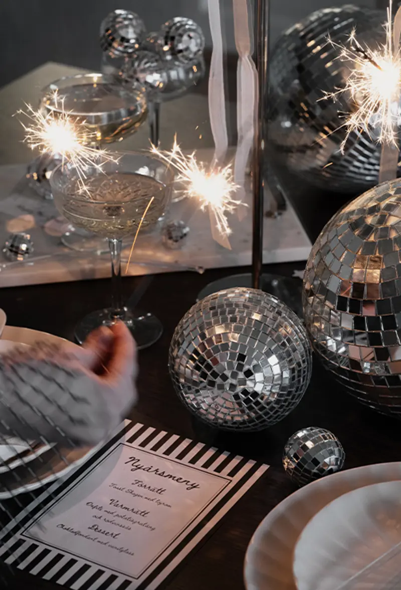 closeup new years dining table setting.