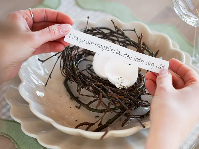 easter note in egg table setting.