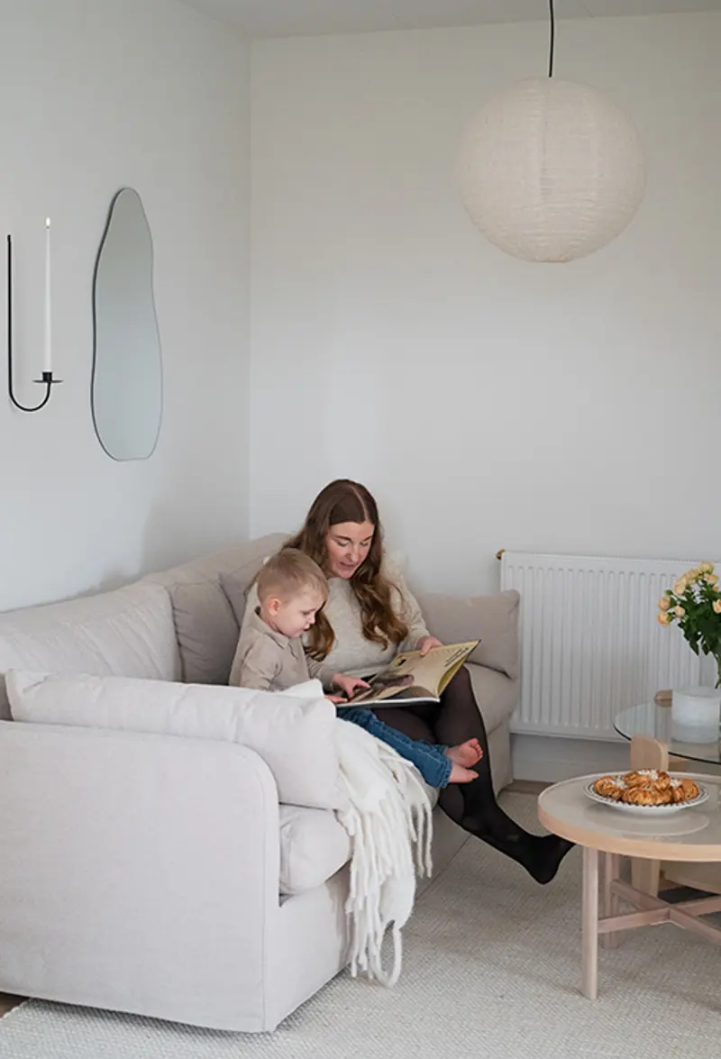 Reading book in peyton sofa