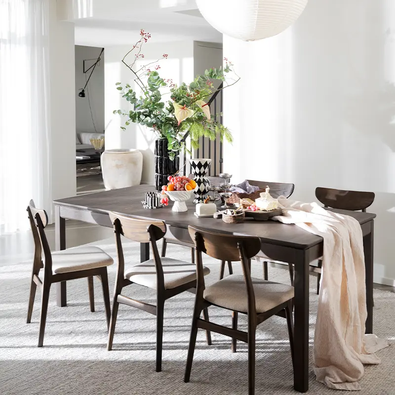 Gardner dining table brown Rodham chair.