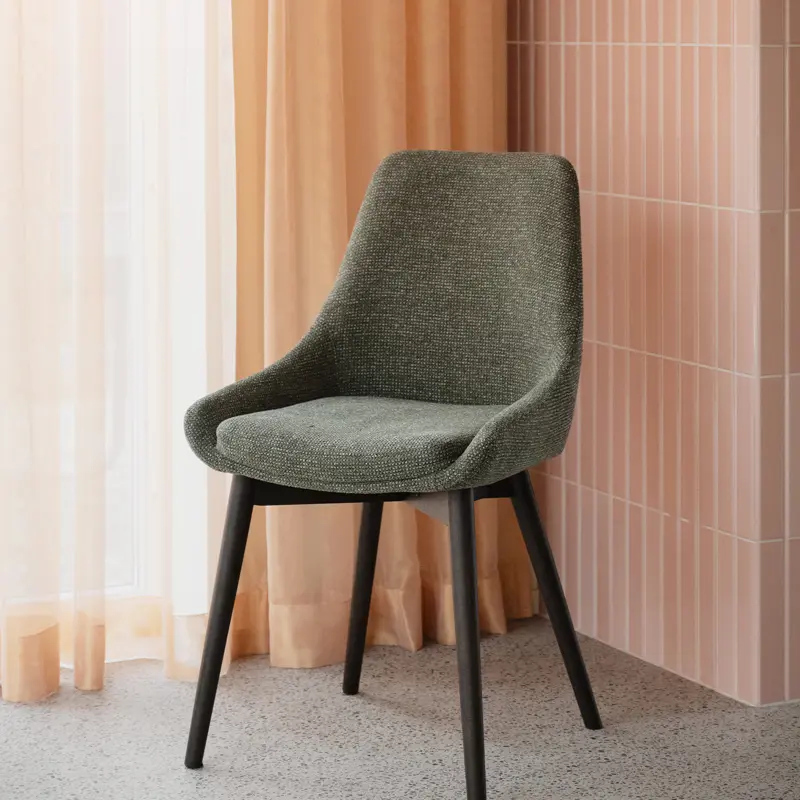 Denly dining chair green brown.